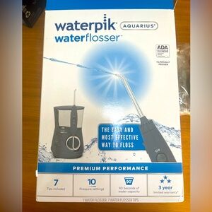 Aquarius Waterpik water Flosser New unopened